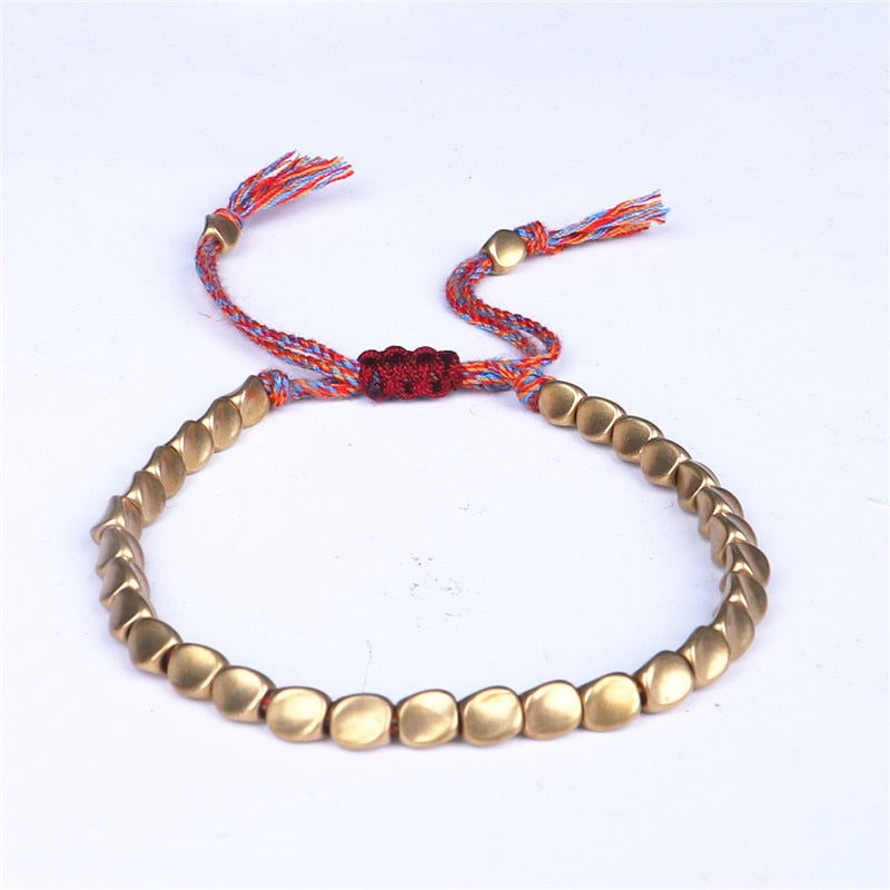 "Embrace Serenity, Wear Eternity: Experience the Spiritual Connection of our Handmade Tibetan Buddhist Braided Copper Beads Lucky Rope Bracelet"